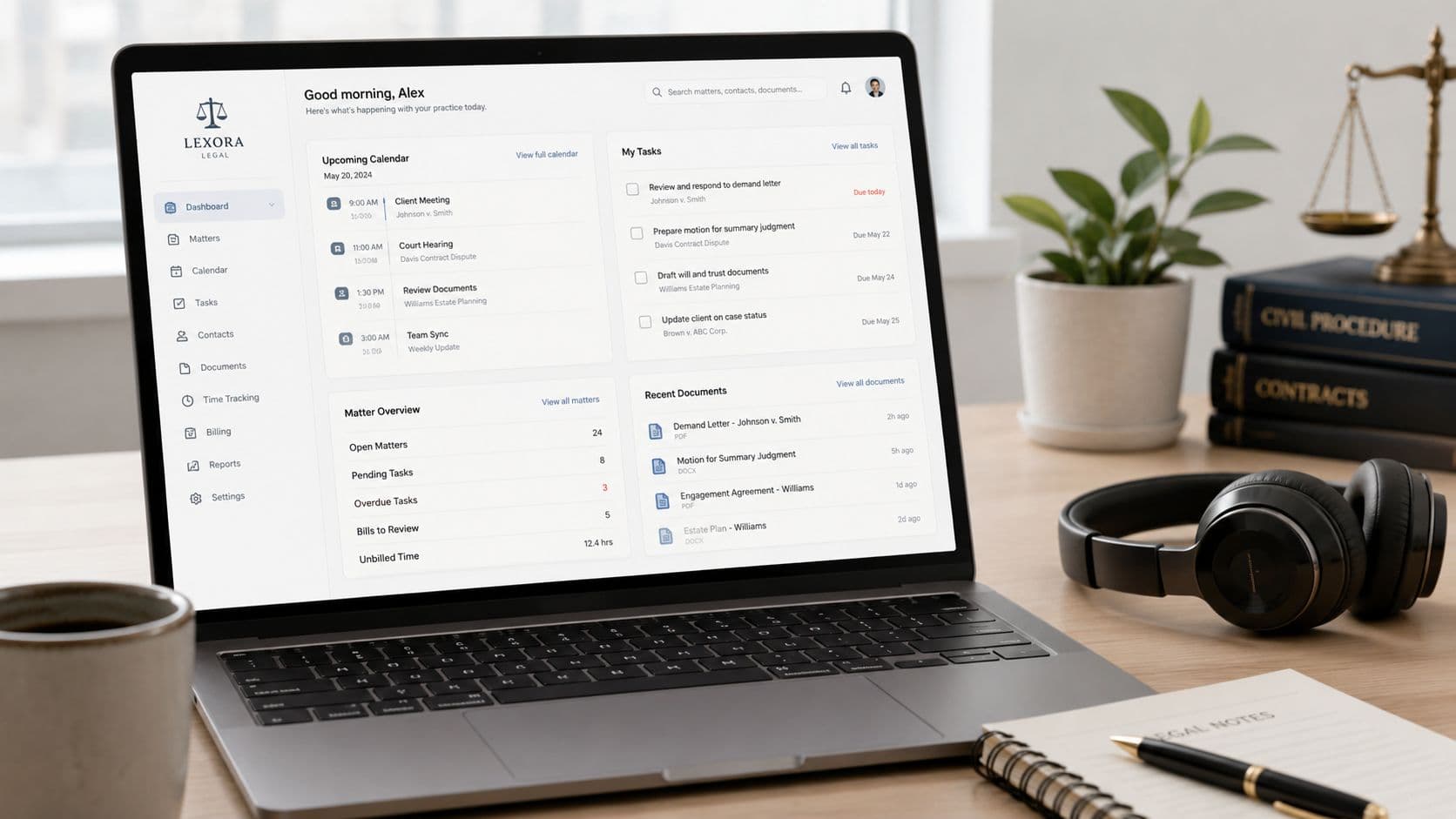 A modern laptop displaying Lexora Legal software dashboard on a professional desk with legal study materials.